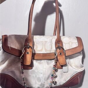 A 2005 Vintage Coach Optic Signature Canvas Leather Purse